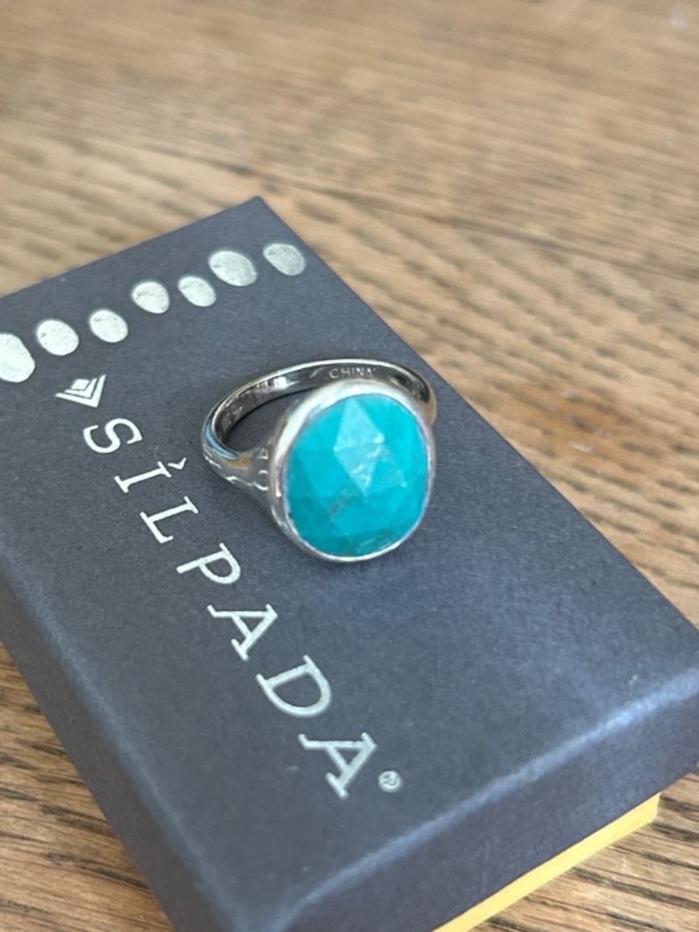 Silpada .925Sterling Silver Ring with Bright Turquoise Gem